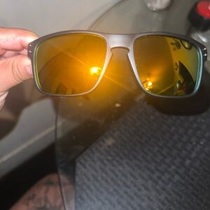 Oakley Black Sunglasses with Gold Lenses
